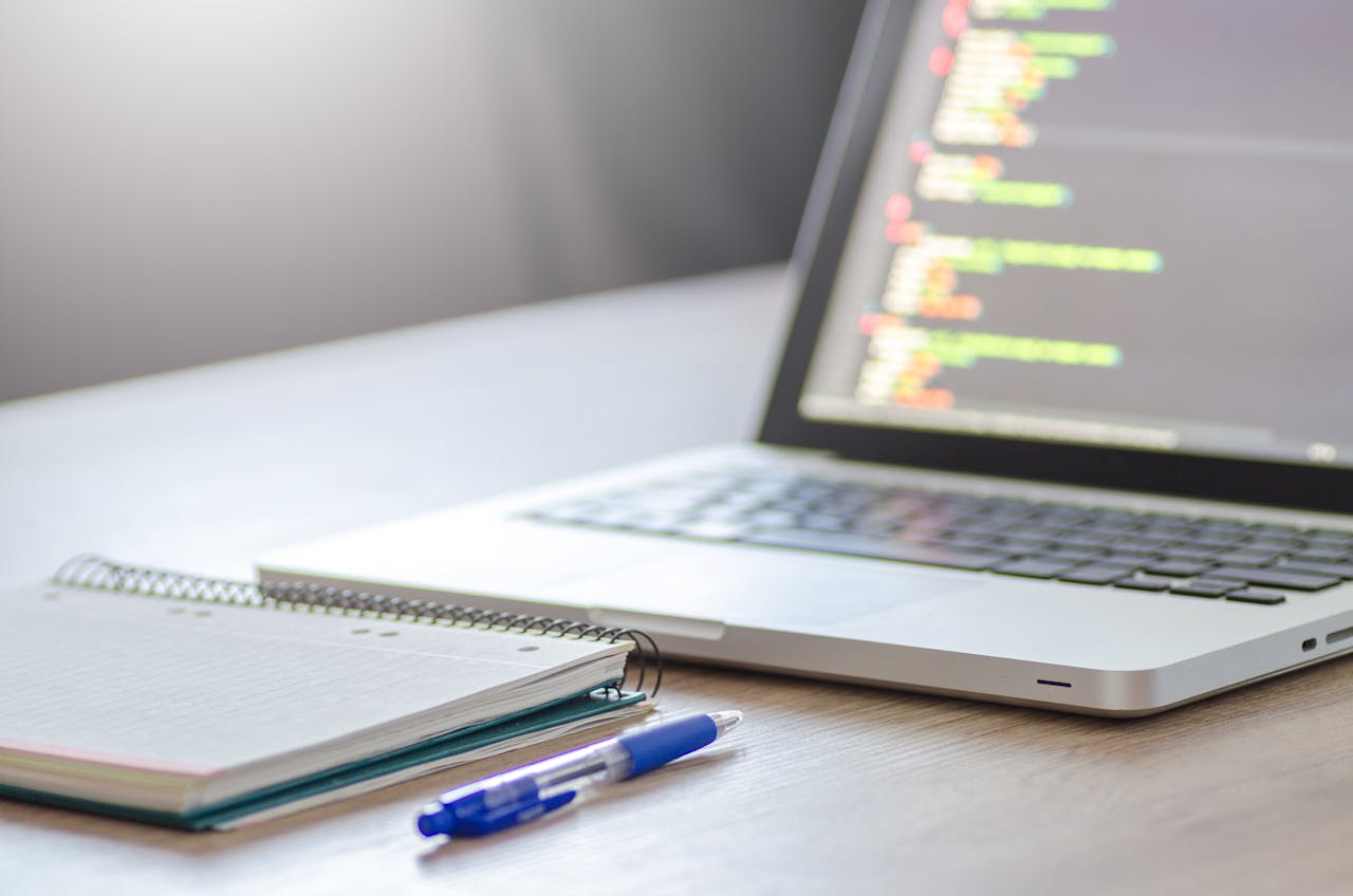 Man working at desk doing web development